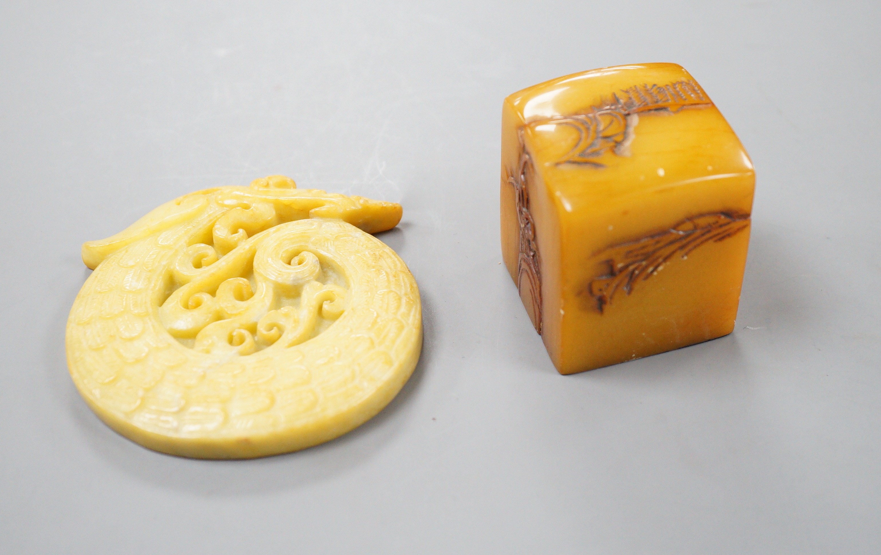A Chinese soapstone seal, 4.5cm tall, and a hardstone plaque